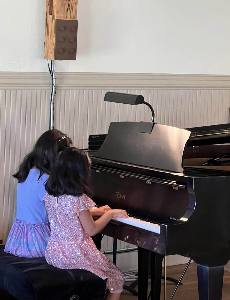 Student playing piano at Bright Keys Piano Studio